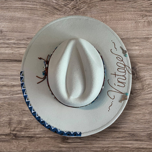 Custom Burned & Designed Vintage Blue Adjustable Hat is made from a combination of felt and polyester